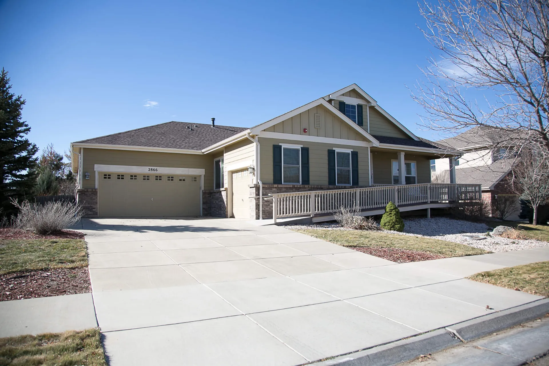 A diagnol image showing the garage and front of the house.