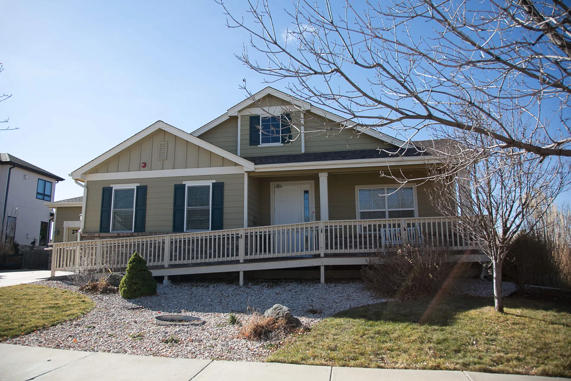 The front of the house and front yard.